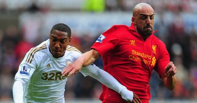 Swansea held firm to play out a goalless draw against Liverpool
